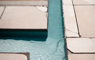 This image shows a pool deck that is being repaired.